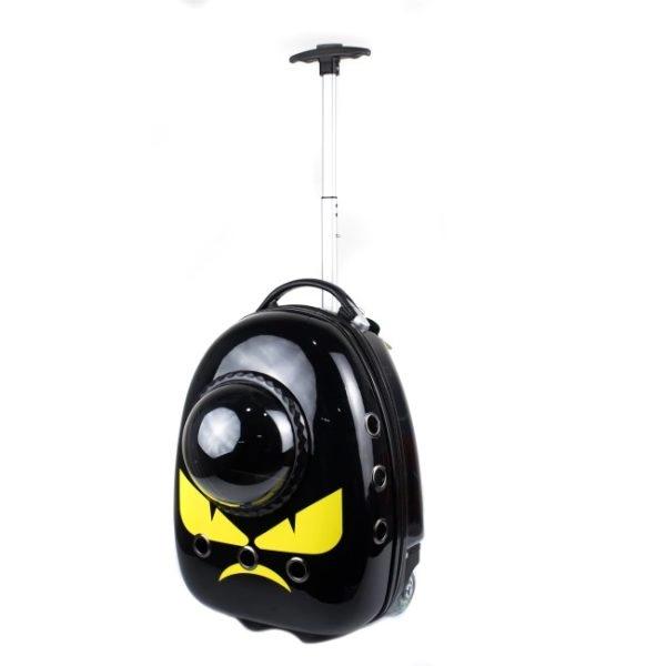 Imagen que muestra el producto Maleta De Ruedas Para Mascotas. Transportin de ruedas para mascotas, cuenta con anillos de ventilación, tapete, rejilla y cupula para intercambiar y manija retráctil ergonómica. Material: Plástico                                                                                                                                              Estampado: Minion, pingüino, gato, pokemon                                                                                                                                                              Disponible: Razas pequeñas de hasta 10Kg