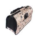 Imagen que muestra el producto Guacal De Tela Estampado Para Mascotas. Guacal de tela estampado, cuenta con malla transpirable en los costados, cremallera al rededor y tirilla para poder transportar. Material: Poliéster Estampado: Disponible: Razas pequeñas.