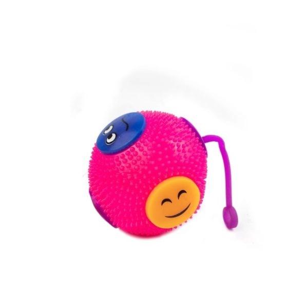 Imagen que muestra el producto Juguete Emojis Para Mascotas. Pelota con estampados de emojis, cuenta con cuerda, sonido y luz led interna. Material: Plástico Color: Amarillo, naranja, verde, rosado Disponible: Razas pequeñas y medianas.