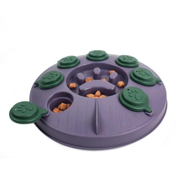 Imagen que muestra el producto Juguete Didactico Para Mascotas. Juguete interactivo de premios, cuenta con orificios y tapas para poder esconder snacks. Material: Plástico                                                                                                 Color: Verde, azul, rosado                                                                        Disponible: Razas pequeñas y medianas.