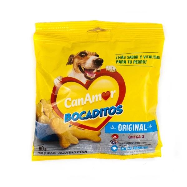 Imagen que muestra el producto Bocaditos Canamor 80G. Suplemento alimenticio mejora el funcionamiento del corazón, músculos, piel y pelo de su mascota. Ingredientes: Harina de trigo integral, margarina, proteína de soya texturizada, hidrolizado de higado de pollo y/o cerdo. Presentación: 80gr Disponible: Para perros de todas las razas y tamaños.