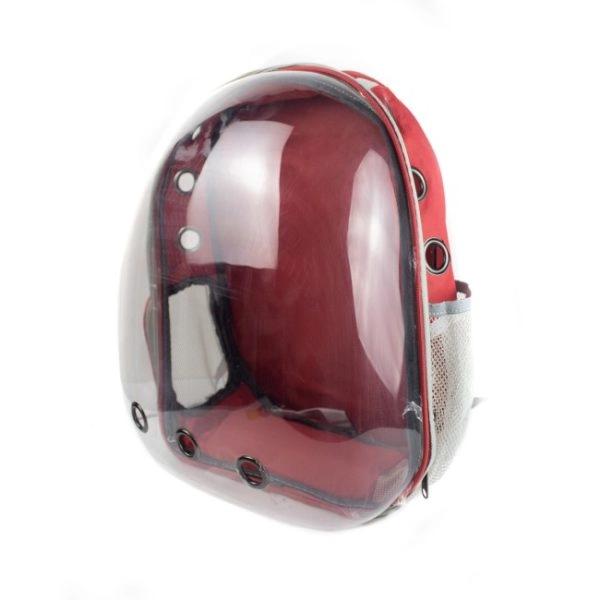 Imagen que muestra el producto Bolso Capsula Para Mascotas. Maleta tipo capsula para mascotas, cuenta respiradero en los costados. Trae tapete. Material: Poliéster, plástico Color: negro, rojo,gris, azul Disponible: Razas pequeñas.