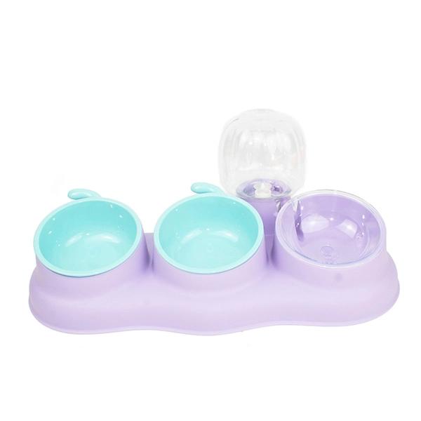 Imagen que muestra el producto Comedero Doble Y Bebedero Con Bowls Removibles. Comedero doble y bebedero con bowls removibles, cuenta con recipiente con sistema tipo cifón que permitirá dejar fluir el agua y piezas antideslizantes. Fácil de armar y limpiar. Material: Plástico Color: Azul con naranja, lila con verde aguamarina Disponible: Razas pequeñas