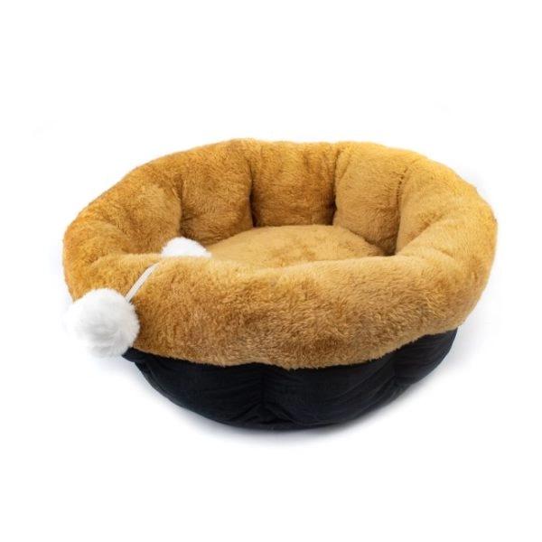 Imagen que muestra el producto Cama Con Bolitas De Felpa Para Mascotas. Cama para mascotas redonda con cubierta de felpa suave y base de tela rigida, cuenta con bolitas de felpa decorativas. Cómoda y resistente. Material: Poliéster y sintético                                                   Color: Azul, negro, café                                                                      Disponible: Razas pequeñas