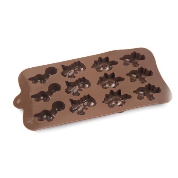 Imagen que muestra el producto Molde De Pastel Dinosaurio. Molde de dinosaurios. Material: Silicona Color: Disponible en la foto.