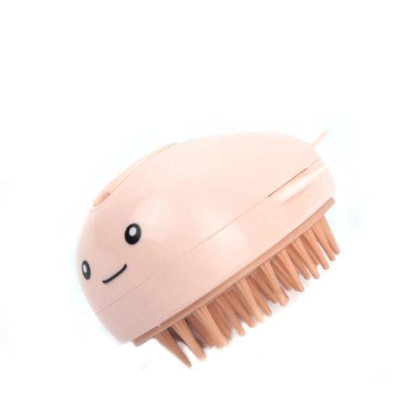 Imagen que muestra el producto Cepillo A Vapor Ballena Para Mascotas. Cepillo a vapor para mascotas, cuenta con puerto de carga y cable USB. Agregue agua o perfume para mascotas y oprima el boton. Material: Plástico, silicona Color: Rosado. Disponible: Razas pequeñas y medianas con pelaje largo.