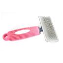 Imagen secundaria del producto Cepillo De Cerdas Para Mascotas. Cepillo carda con cerdas tipo púas ideales para desenredar y alisar el pelaje, cuenta con mango antideslizante. Material: Acero inóxidable, goma Color: Rosado, azul, rojo Disponible: Razas pequeñas y medianas de pelaje largo o rizado.
