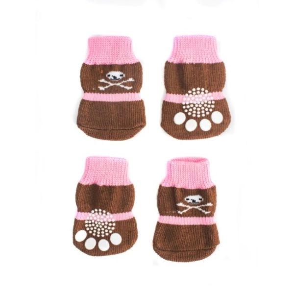 Imagen que muestra el producto Medias Para Mascotas. Medias para mascotas con tejido antideslizante. Talla S,M Material: Poliéster                                                                     Color:Azul, café, negro, rosado                                                                  Disponible: Razas pequeñas y medianas.