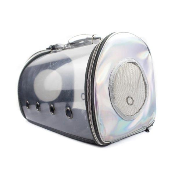 Imagen que muestra el producto Guacal De Tela Transparente. Guacal transparente con respiraderos a los costados, cuenta con correa y tapete interno. Material: Plástico, poliéster Color: Disponible en la foto Disponible: Razas pequeñas.