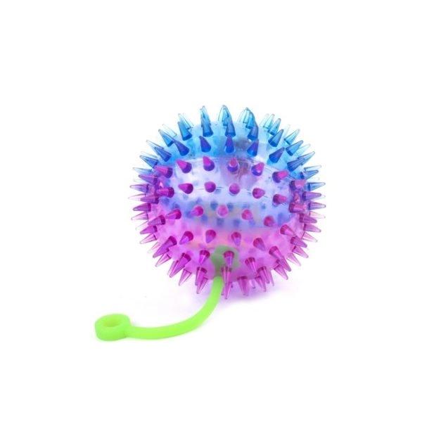 Imagen que muestra el producto Juguete Semitransparente Para Mascotas. Pelota bicolor semitransparente, cuenta con una cuerda, sonido y luz led interna. Material: Plástico Color: Amarillo, morado, rosado Disponible: Razas medianas.