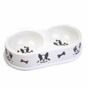 Imagen que muestra el producto Comedero Redondo Doble Pequeño Para Mascotas. Comedero doble para mascotas. Material: Melamina Color: Disponible en la foto Disponible: Razas pequeñas