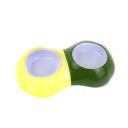 Imagen que muestra el producto Comedero Bicolor  Para Mascotas. Comedero bicolor redondo, cuenta con dos recipientes. Material: Plástico  Color: Verde, rosado                                                                                                     Disponible: Razas pequeñas. Medidas: Largo 30* Ancho 17* Alto 6cm