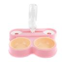 Imagen que muestra el producto Comedero Con Cuatro Compartimentos Para Mascotas. Comedero para mascotas, cuenta con cuatro compartimentos para agua y comida y una botella dispensadora. Material: Plástico Color: Rosado, verde Disponible: Razas pequeñas. Medidas: Largo35 cm* Ancho13 cm*Alto 54.5 cm