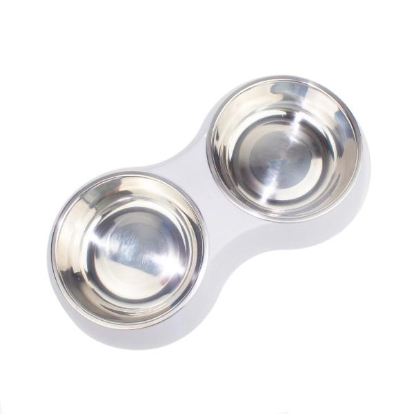 Imagen que muestra el producto Comedero Con Piezas Antideslizantes. Comedero doble con bowls removibles, cuenta con piezas antideslizantes. Material: Plástico, metal Color: Verde aguamarina, palo rosa, morado grisaceo Disponible: Razas pequeñas