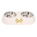 Imagen secundaria del producto Comedero Doble Con Moño. Comedero doble para mascotas cuenta con moño decorativo, bowls removibles y piezas antideslizantes. Material: Plástico, metal
Color: Café, hueso Disponible: Razas pequeñas