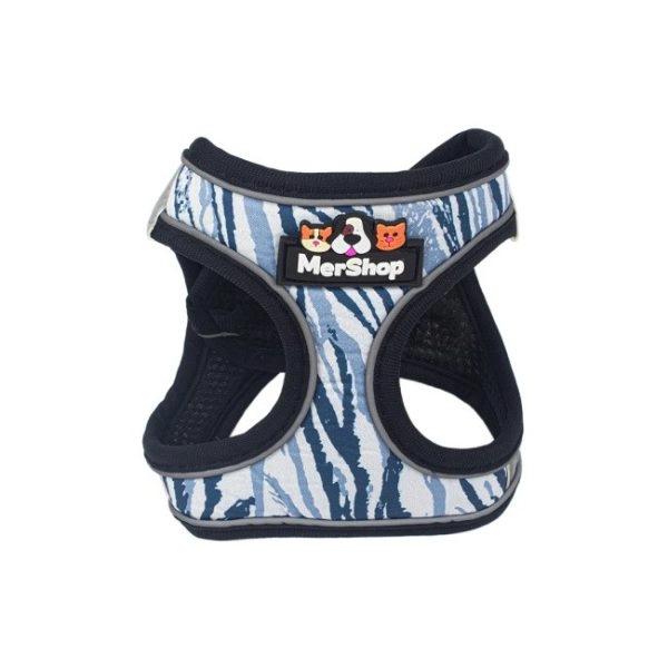 Imagen que muestra el producto Pechera Mascotas Mershop. Pechera estampada para mascotas, cuenta con tejido reflectivo, velcro ajustable, broche de seguridad y anillos tipo D para fijar la correa. Material: Poliéster Color/Estampado: Rosado, negro, azul, verde. Disponible: Razas pequeñas.