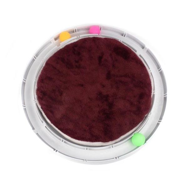 Imagen que muestra el producto Juguete Interactivo Circular  Para Mascotas. Pista de pelotas en forma circular, cuenta con dos pelotas de plástico y alfombra de felpa en el medio. Material: Plástico, poliéster Color: Blanco Disponible: Razas pequeñas