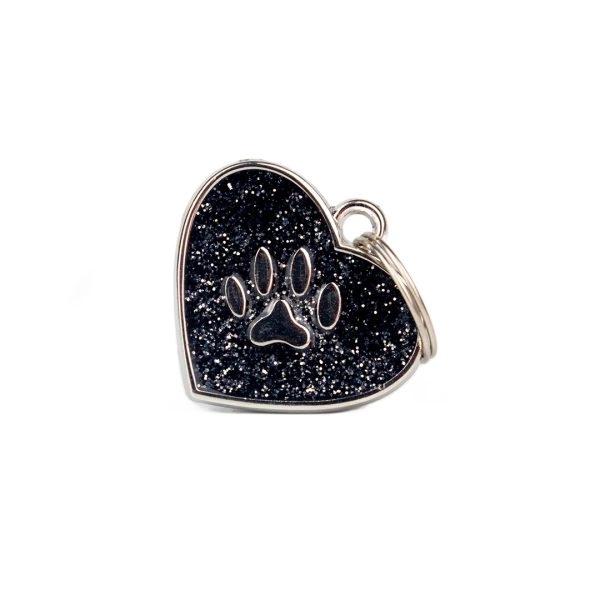 Imagen que muestra el producto Placa De Identificación Corazón. Placa de identificación con acabado escarchado, cuenta con forma de corazón y grabado de huella. Material: Metal Color: Rosa, rojo, negro, azul, plateado, fucsia. Disponible: Razas pequeñas y medianas.