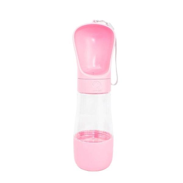 Imagen que muestra el producto Dispensador De Agua Portatíl. Bebedero portátil para mascotas, cuenta con anillo de sellado para evitar fugas de agua y correa de muñeca para transportar. Material: Plástico Color: Azul, rosado, blanco, verde. Disponible: Razas pequeñas, medianas y grandes