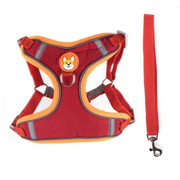 Imagen que muestra el producto Pechera Estilo Chaleco Para Mascotas. Pechera anti-tirones cuenta con hebillas ajustables, broche de seguridad y correa. Material: Poliéster, metal Color: Café, naranja, verde, rojo Disponible: Razas pequeñas, medianas