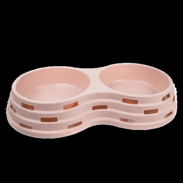 Imagen que muestra el producto Comedero Doble De Mascotas. Comedero doble para mascotas. Material: Plástico Color: Rosado, verde, azul DIsponible: Razas medianas y grandes