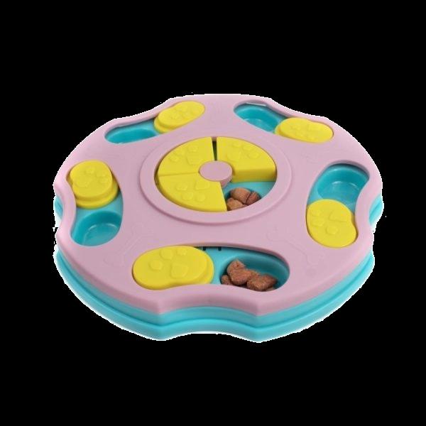 Imagen que muestra el producto Juguete Didactico De Premios Para Mascotas. Juguete interactivo de premios, cuenta con orificios y tapas para poder esconder snacks. Material: Plástico Color: Blanco, morado Disponible: Razas pequeñas.