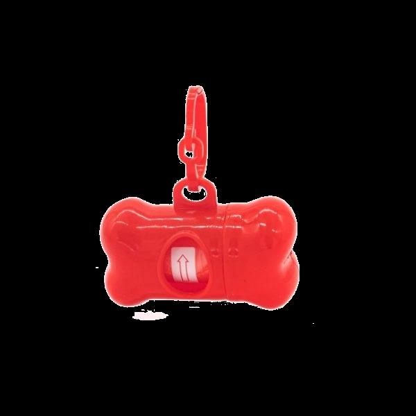 Imagen que muestra el producto Porta Bolsa Huesito Para Mascotas. Porta bolsas con diseño de hueso, cuenta con un orificio en donde podrá guardar las bolsas higiénicas y gancho ideal para fijar al collar o arnés de su mascosta. Cuenta con rollo de repuesto. Material: Plástico Color: Rojo, vinotinto, azul oscuro, azul claro, rosado,verde, negro, naranja, palo rosa, morado. Disponible: Razas pequeñas, medianas y grandes