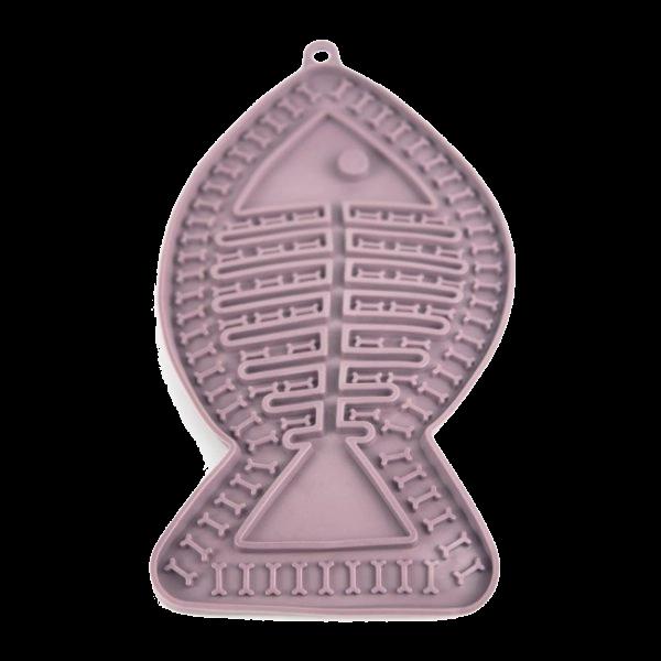 Imagen que muestra el producto Tapete De Lamer Para Mascotas. Tapete de lamer para mascotas, cuenta con ventosas para pegar en superficies planas. Ideal para una alimentación mas lenta. Material: Silicona Color: Verde, azul, curuba, morado Disponible: Razas pequeñas, medianas y grandes.